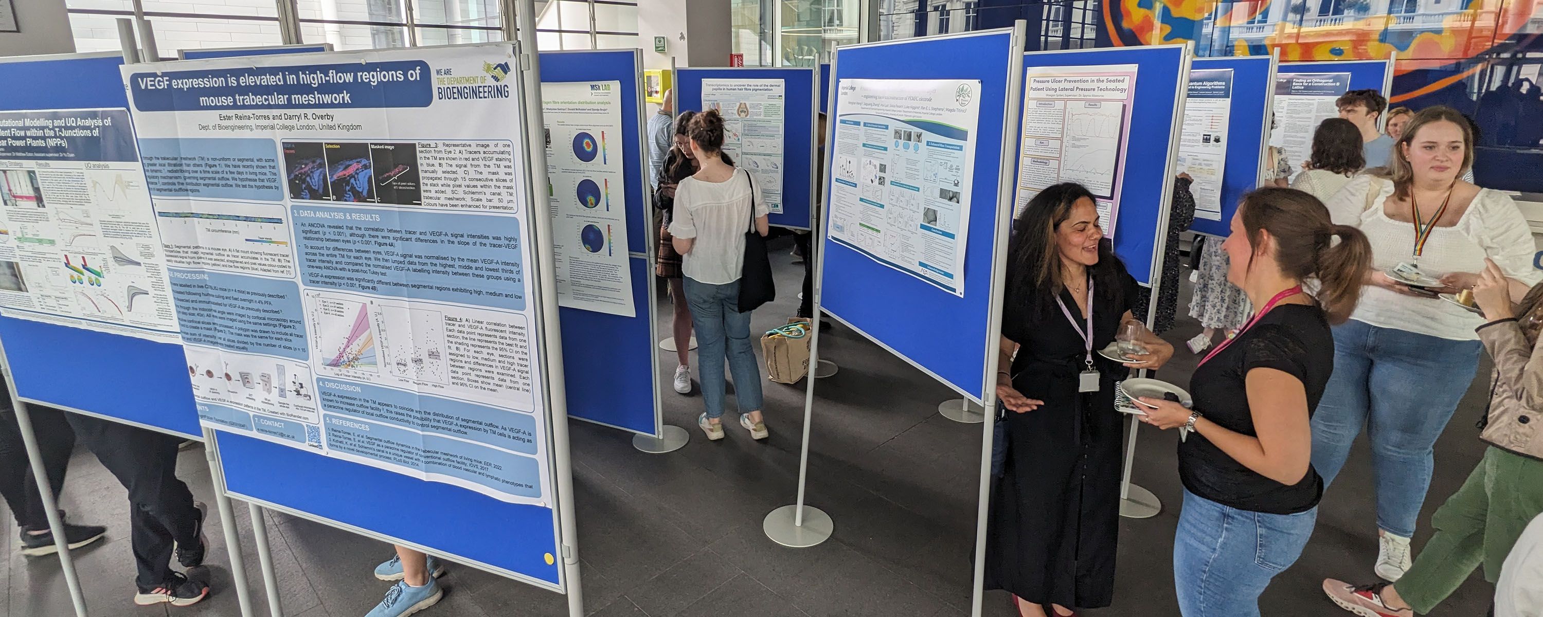 People attending a poster exhibition