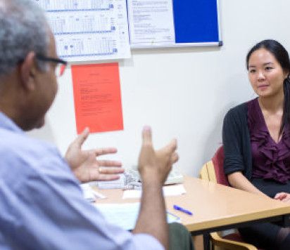 Doctor talking to patient