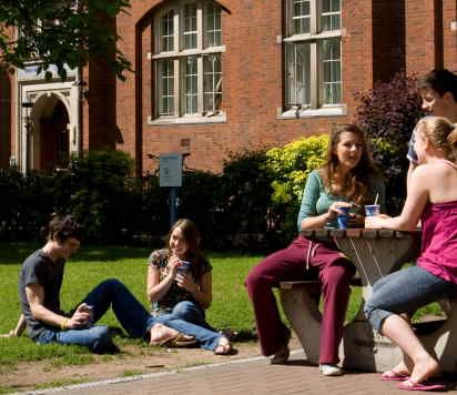 Students sitting in Beit Quad