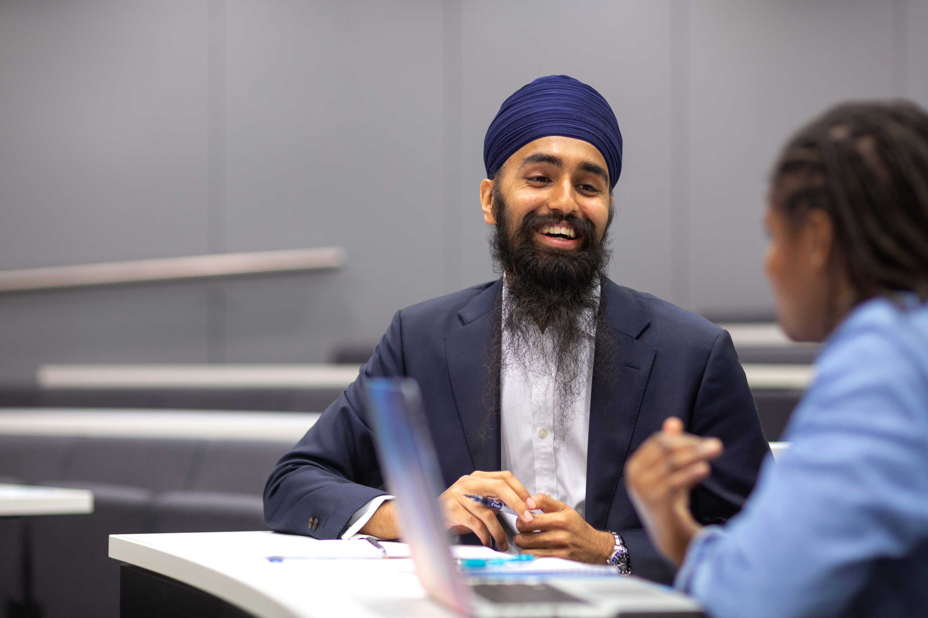 Two business school students talking