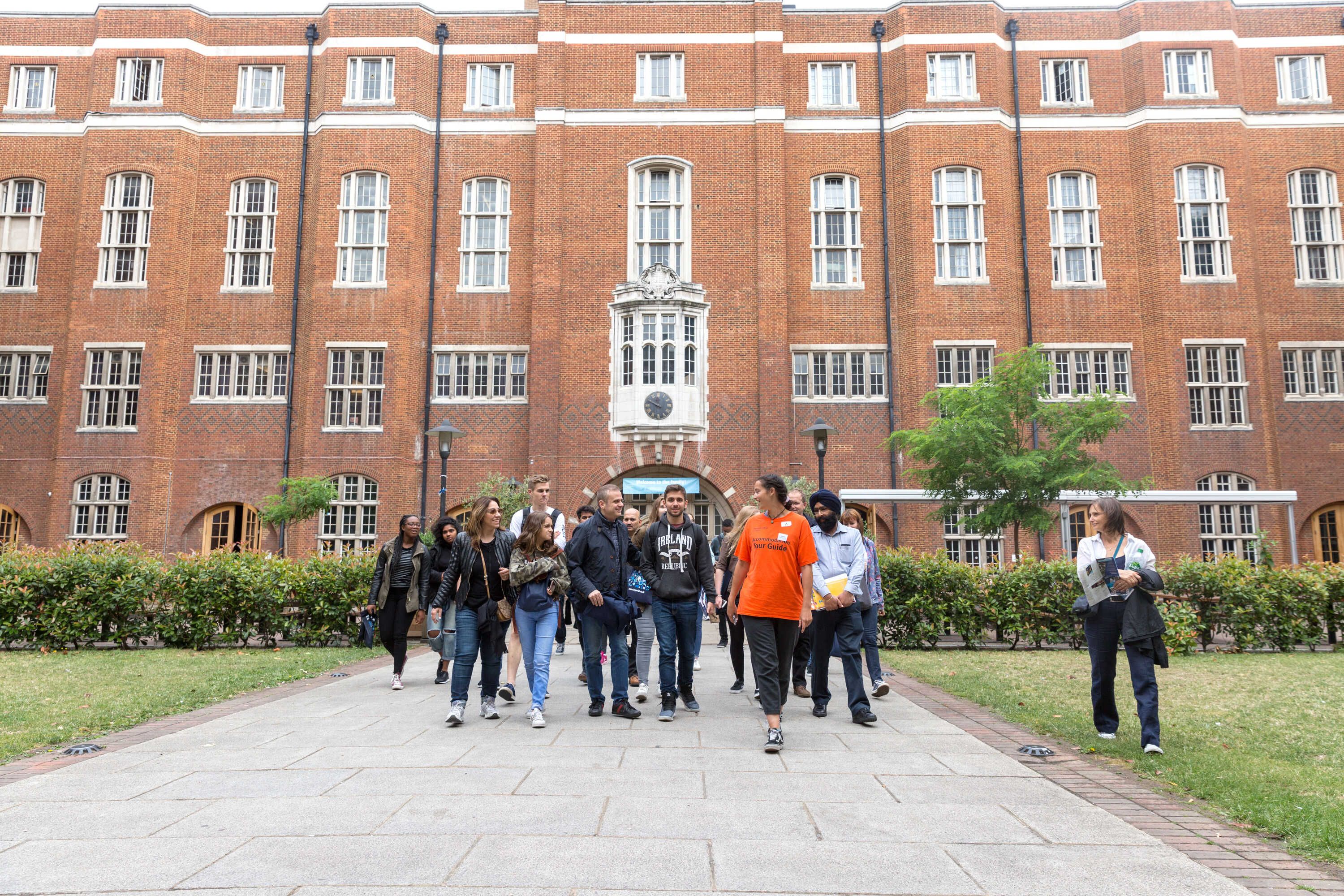 A student leading a tour in Beit Quad