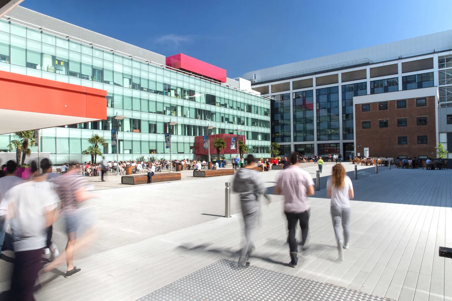 Students walking across an open courtyard