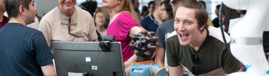 Festival visitor interacting with robot