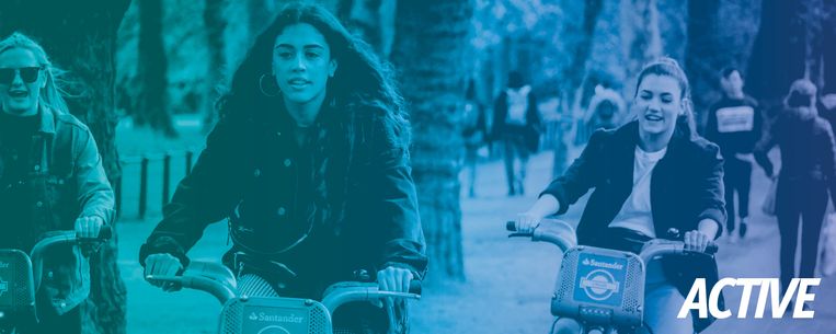 Two women riding bicycles