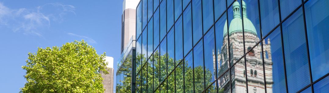 Reflection of Queen's Tower in a window