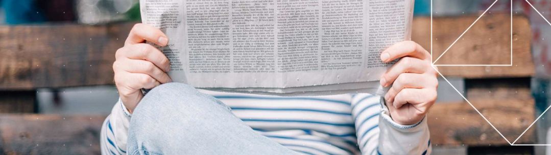 Man reading newspaper