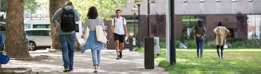 Students walking near the library.