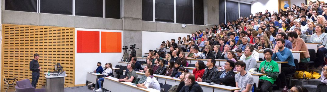 people sitting in a lecture hall