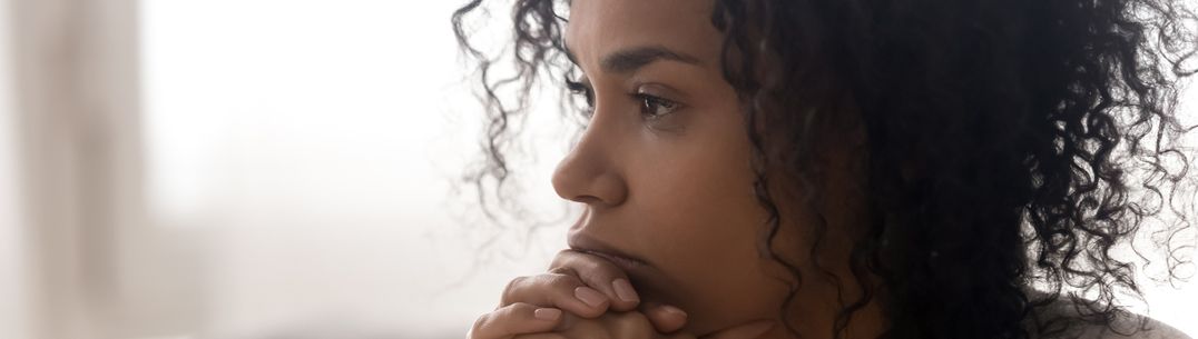 Young woman thinking