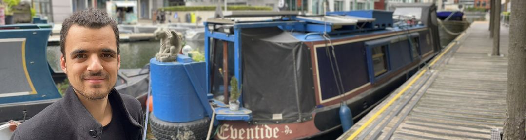 Jordan Stone with his canal boat in background