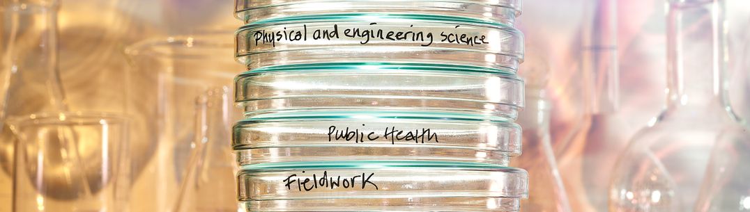 A tower of petri dishes labelled with 'physical and engineering sciences', 'public health' and 'fieldwork'.