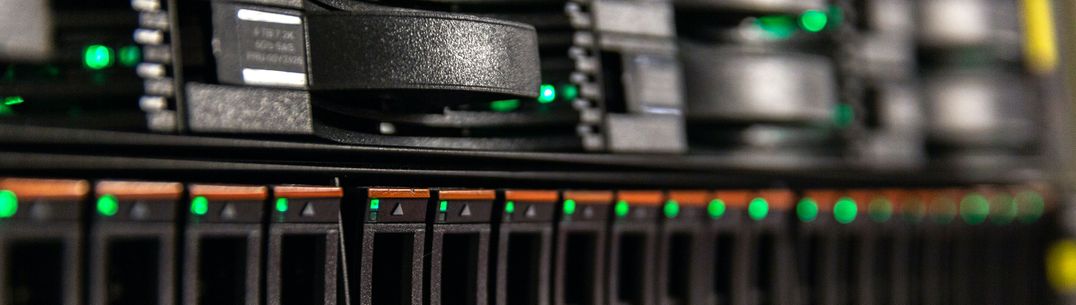 A banner image showing the front of a server within the College data centre