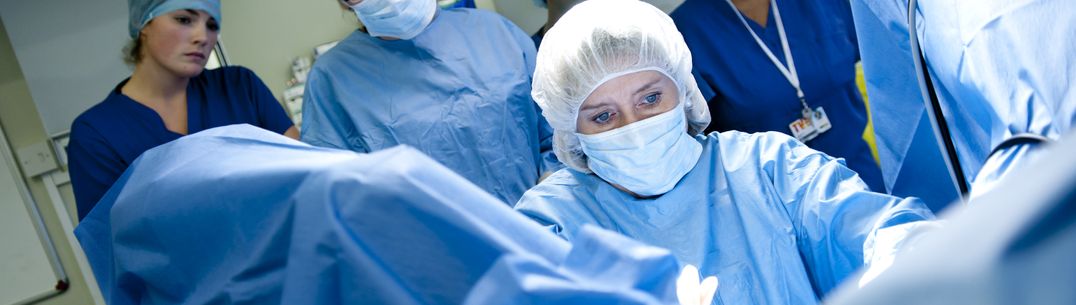A picture of a surgeon in an operating theatre