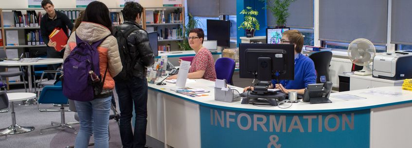 students at careers service desk