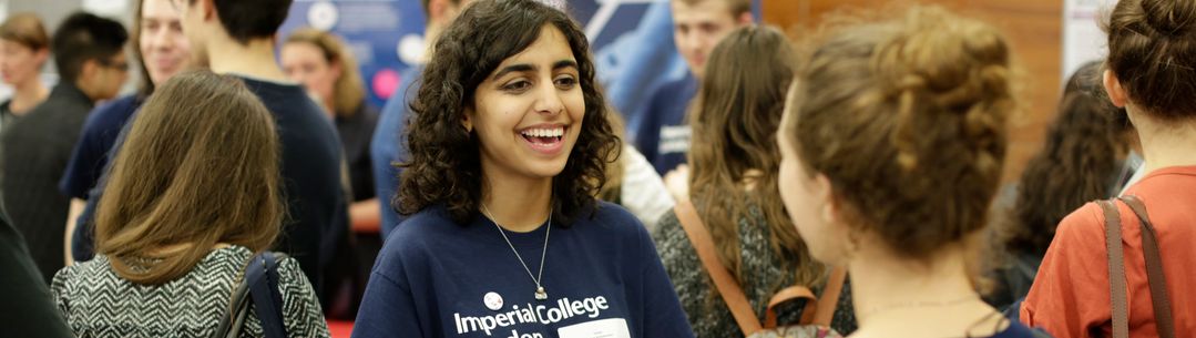 A student ambassador greets a visitor on Open Day.