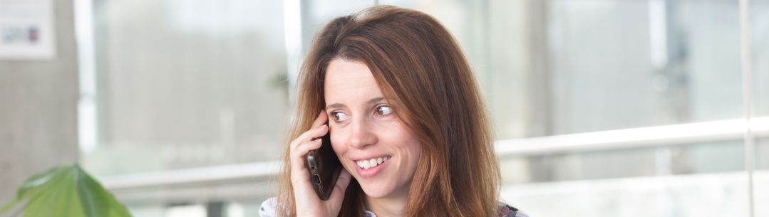A woman speaking on the phone
