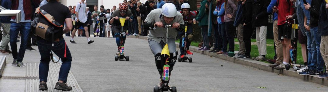 Students at the start line for electric scooter race