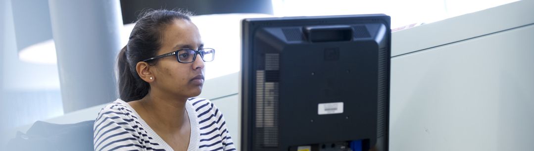 Woman working at a computer