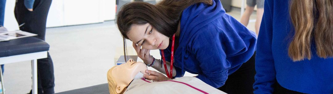 Student undertaking basic life support training