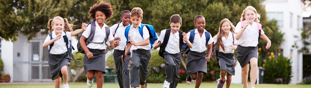 Children running in a school playground