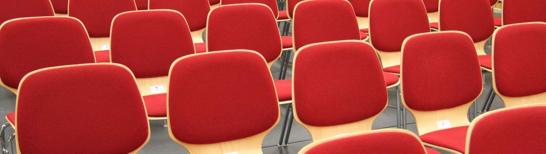 Rows of empty seats in a lecture hall