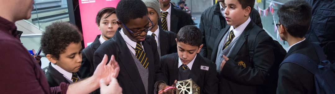 School students with a CubeSat