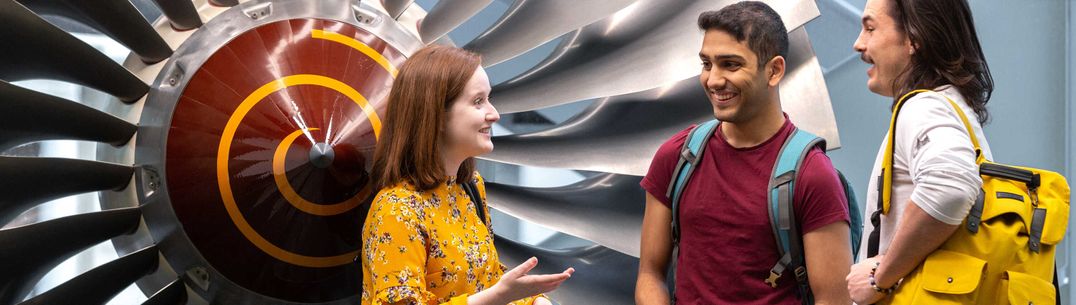 Undergraduate students and Imperial Outreach student mentors in the City and Guilds building foyer