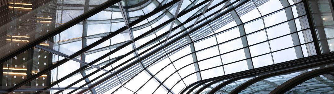 Looking upwards in the I-HUB, panes of glass in the roof and walkways