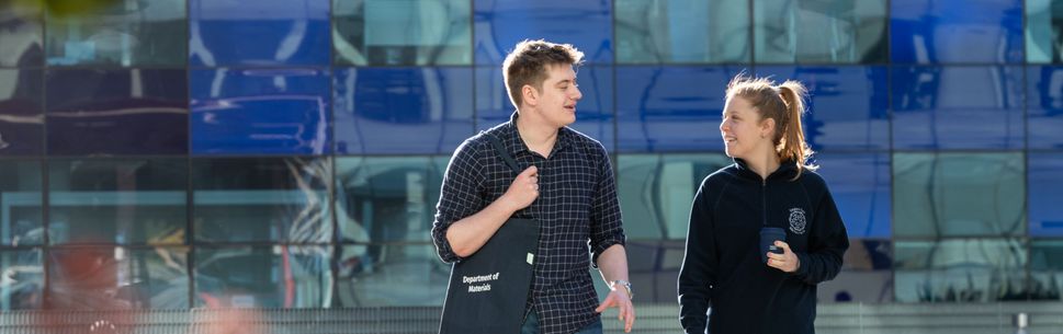 Two students walking in Dalby Court