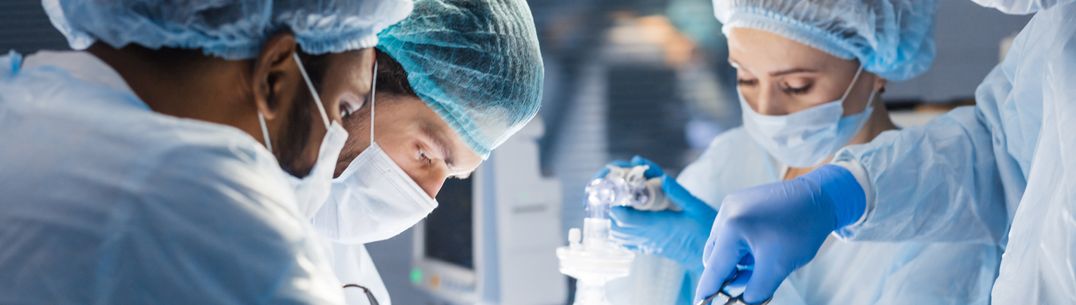 A picture of surgeons in an operating theatre