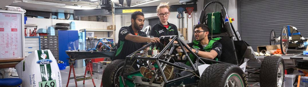 Students with the Formula Student prototype