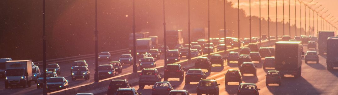 image of traffic during sunset