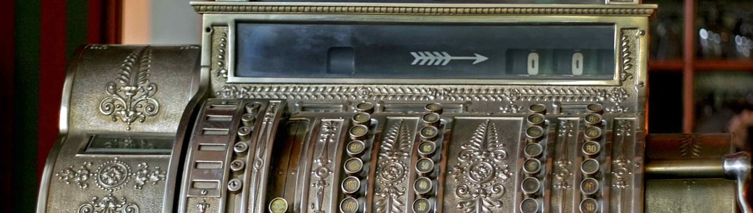 Very old vintage style cash register close up