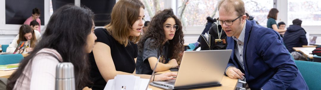 Students in a seminar room with