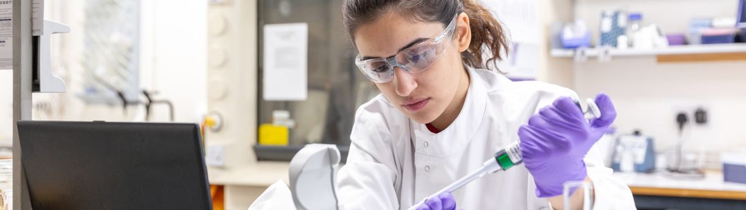 student using pipette