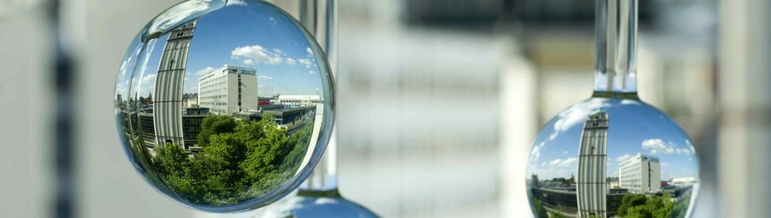 Two Silver baubles with the same  image of South Kensington imperial campus buildings