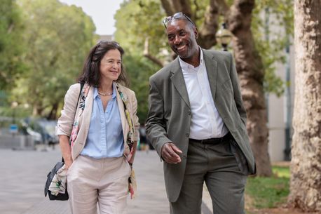 Wayne and Lesley walking on campus