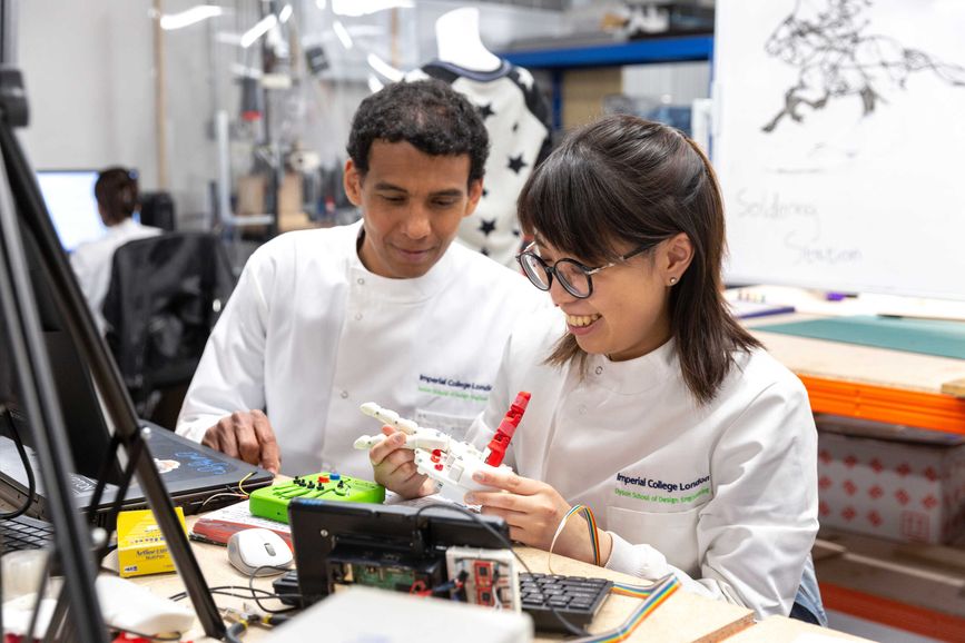 Dr Nicolas Rojas (Senior lecturer) discussing robotic hand design with Lois Liow (graduated MEng student)