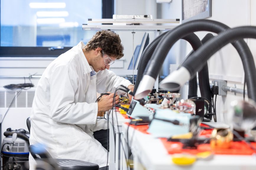 Design Engineering Lab Student in a lab