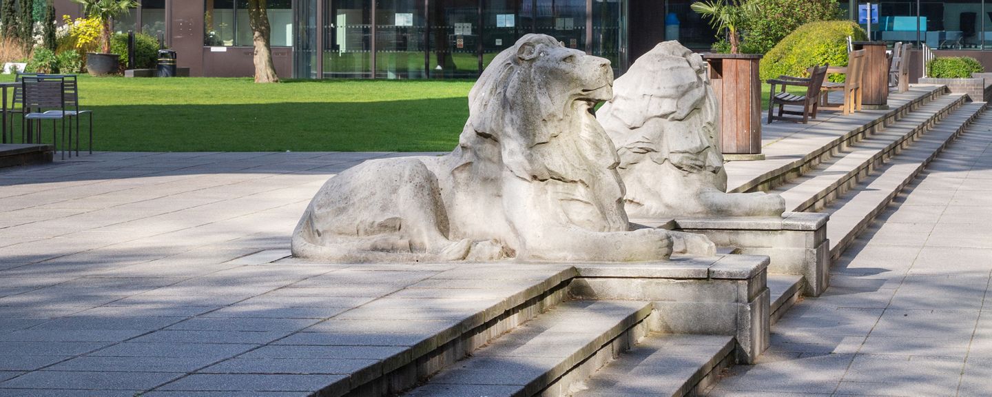Lion statues next to the Queen's Tower