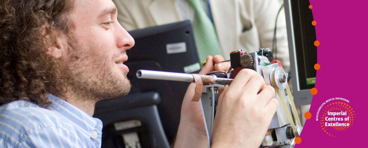 A man working on a metallic medical device