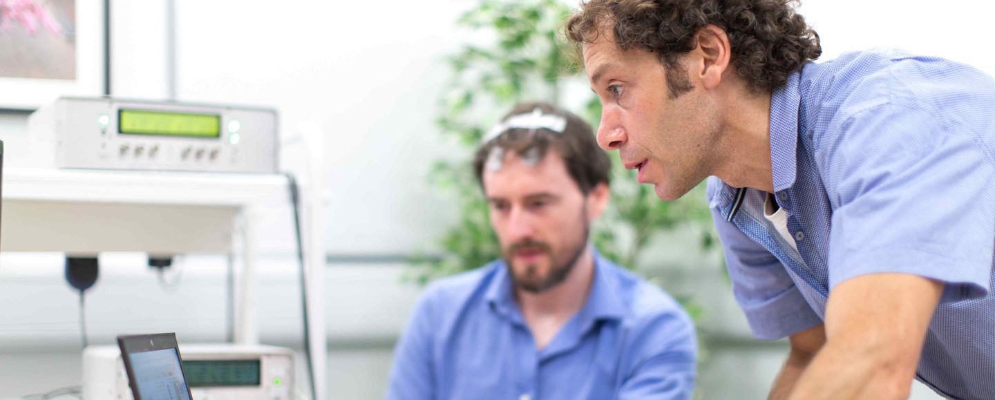 Nir Grossman recording the brain activity of a test subject