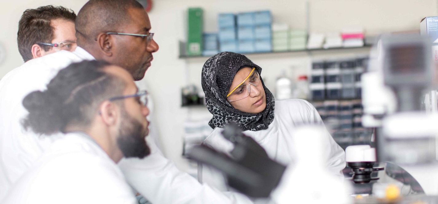 Four research students in a lab