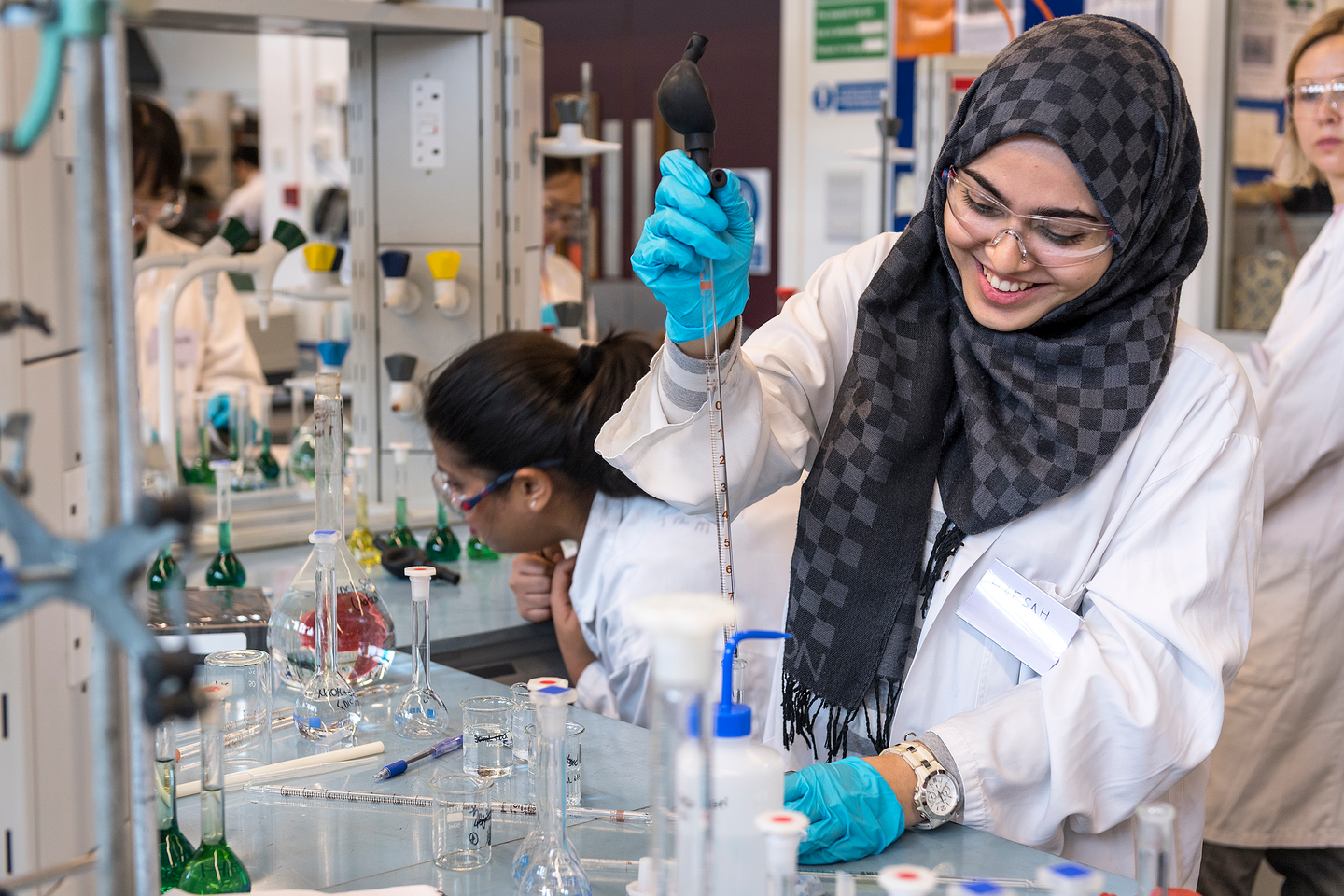 Civil engineering students working in a lab