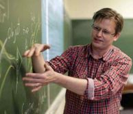 Professor Martin McCall explaining light research on blackboard