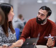 Two students talking to each other