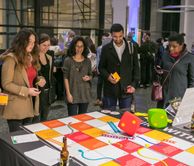 Adults playing a game at one of our Lates