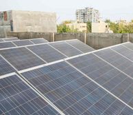 solar panels in an urban environment in a developing country