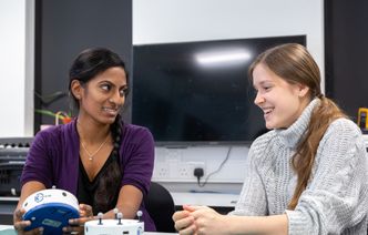Aeronautics student and lecturer collaborating
