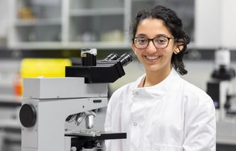A woman working in a laboratory